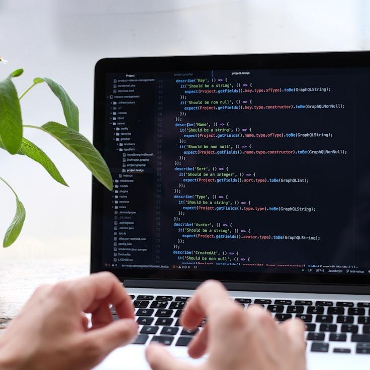 Mobile app project planning workspace with devices and development tools